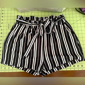 Black and white striped shorts with tie belt